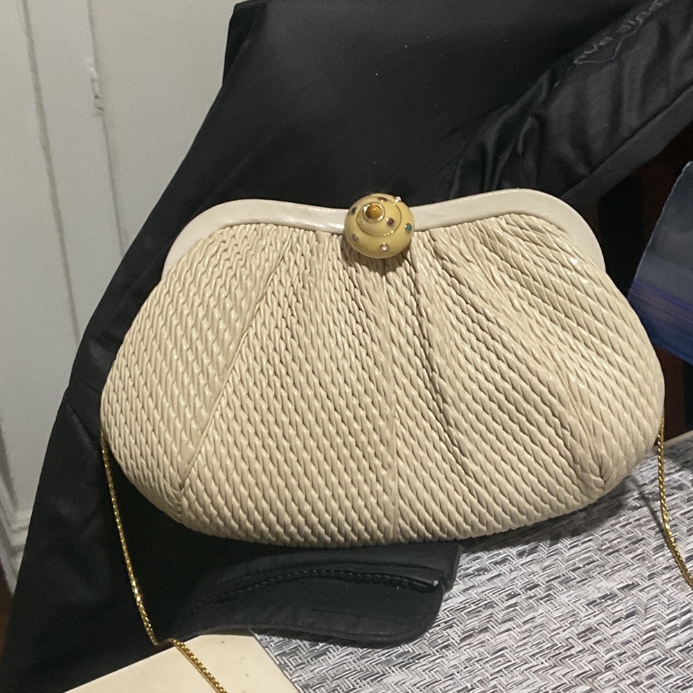 Judith Leiber Cream Textured Clutch in cream lizard skin with a horn push lock